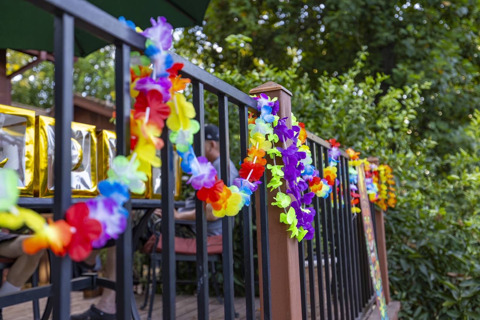 Leis on the deck railing